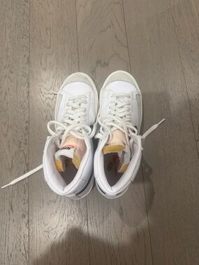 Nike White Women's High-Top Sneakers with Yellow Tongue Accent